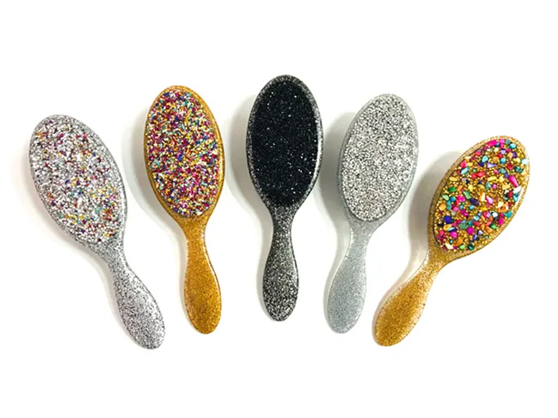 Bàn chải tóc bằng nhựa hình bầu dục Bling có tay cầm